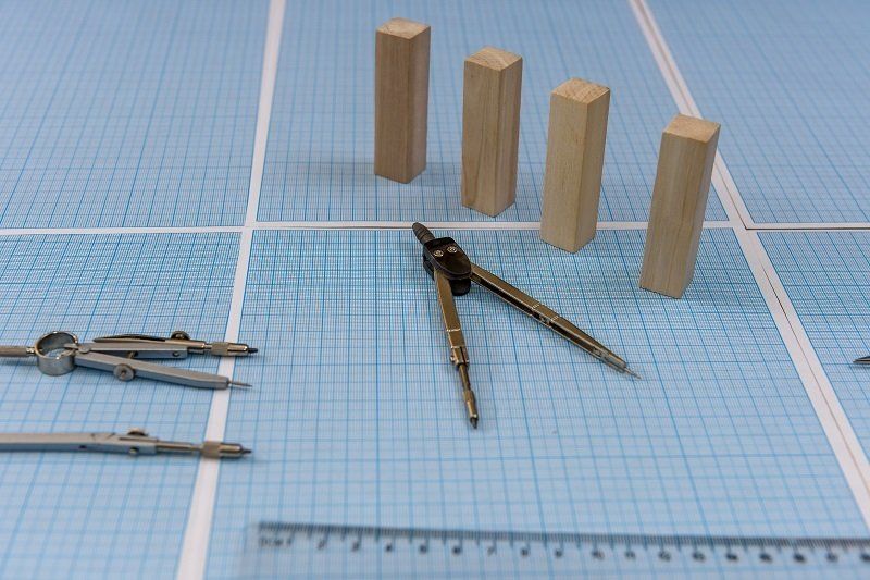 Compasso e carta millimetrata