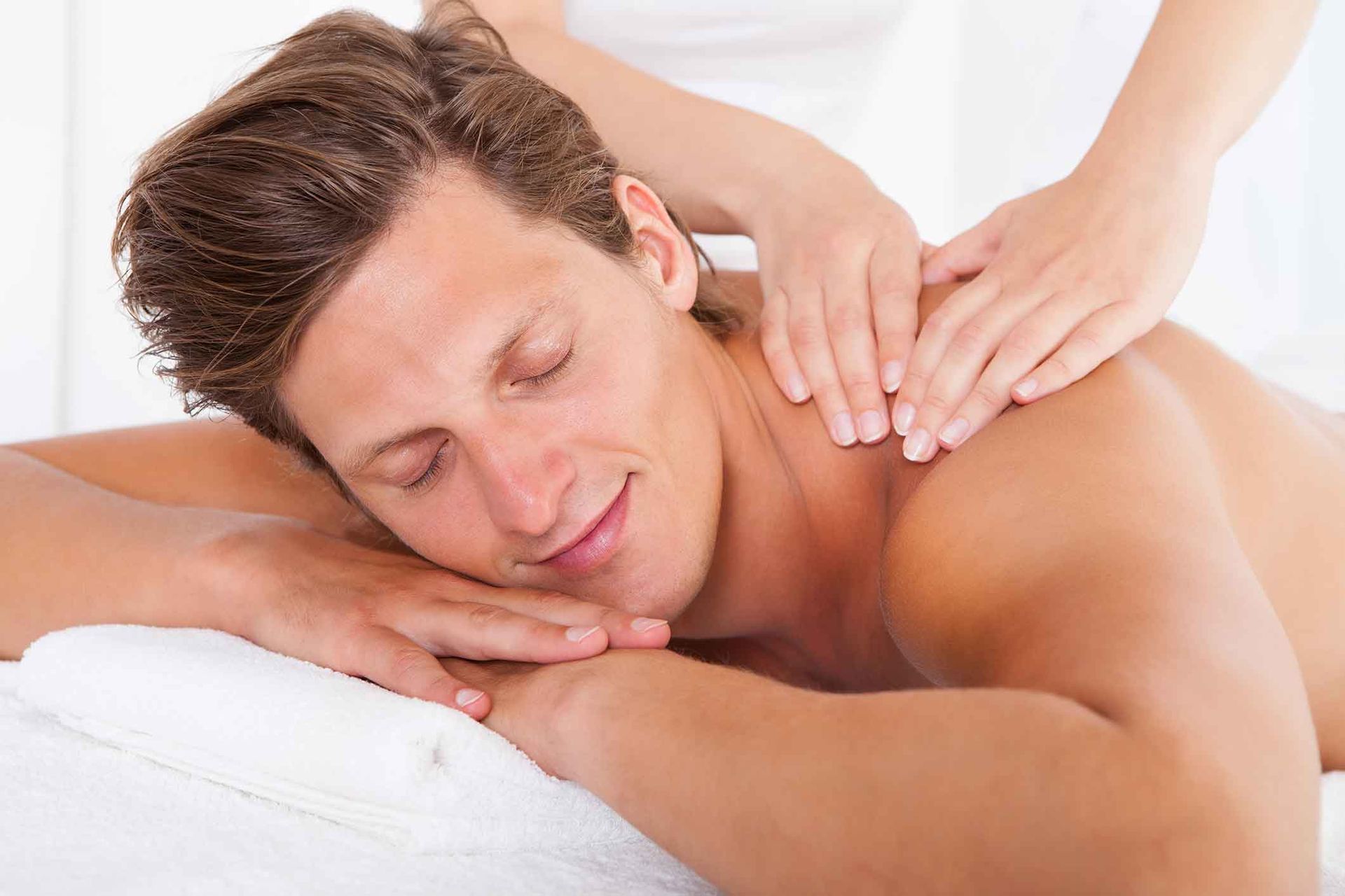 A Man Is Getting A Massage At A Spa – Coral Springs, FL - Life In Motion Bodyworks and Aesthetics