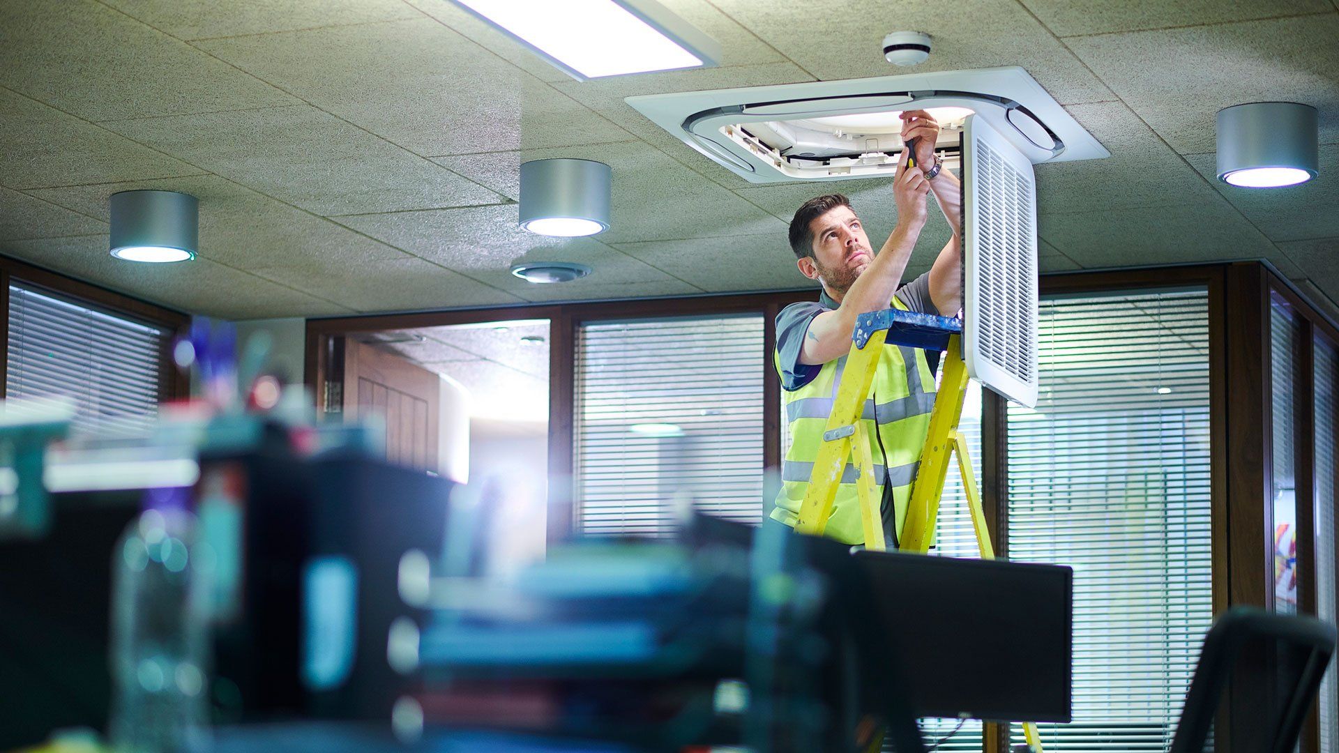 Man Repairing Air Conditioner — Douglasville, GA — Parks Davis Air Conditioning & Heating