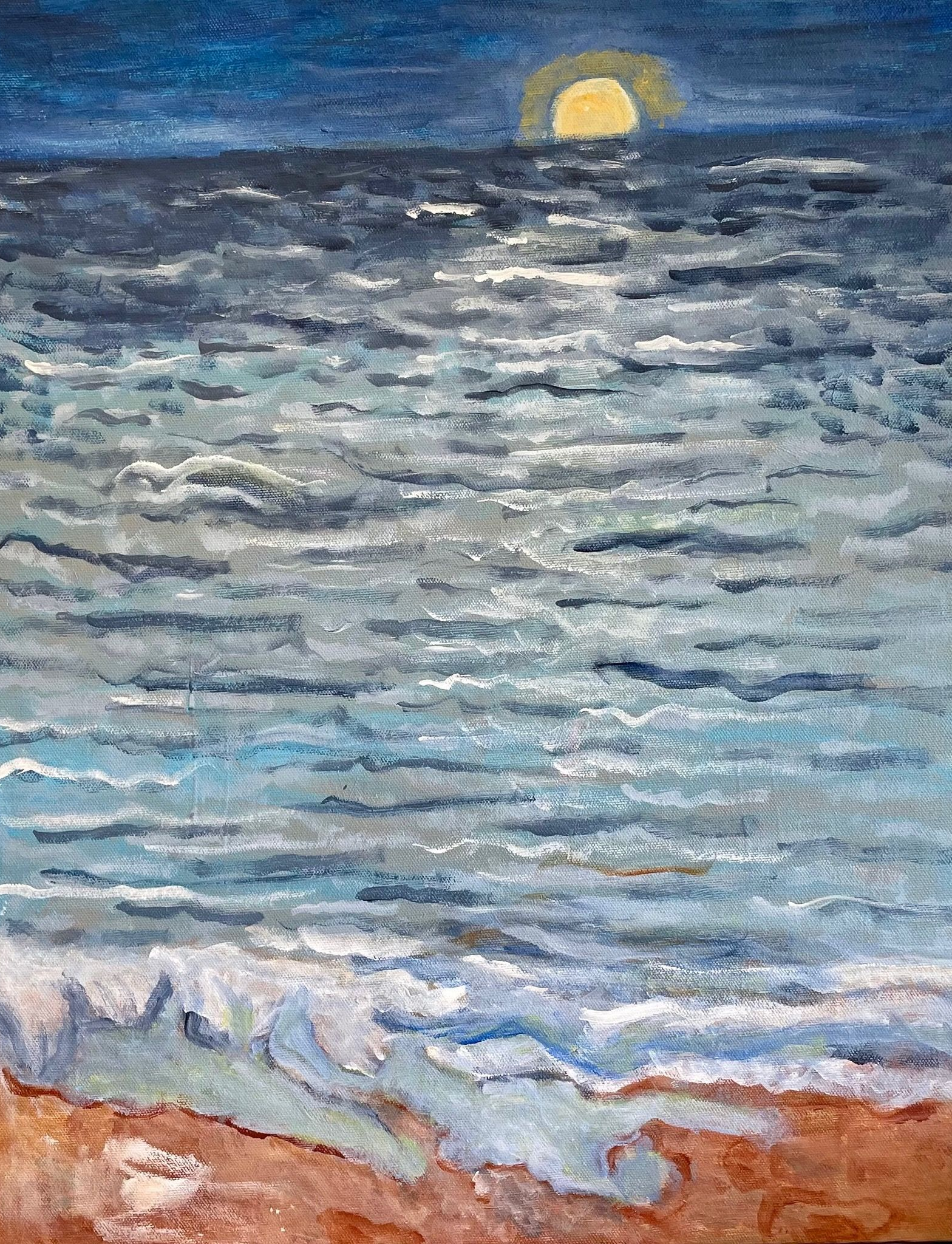 Moonlit ocean waves with a glowing moon over a rocky shoreline