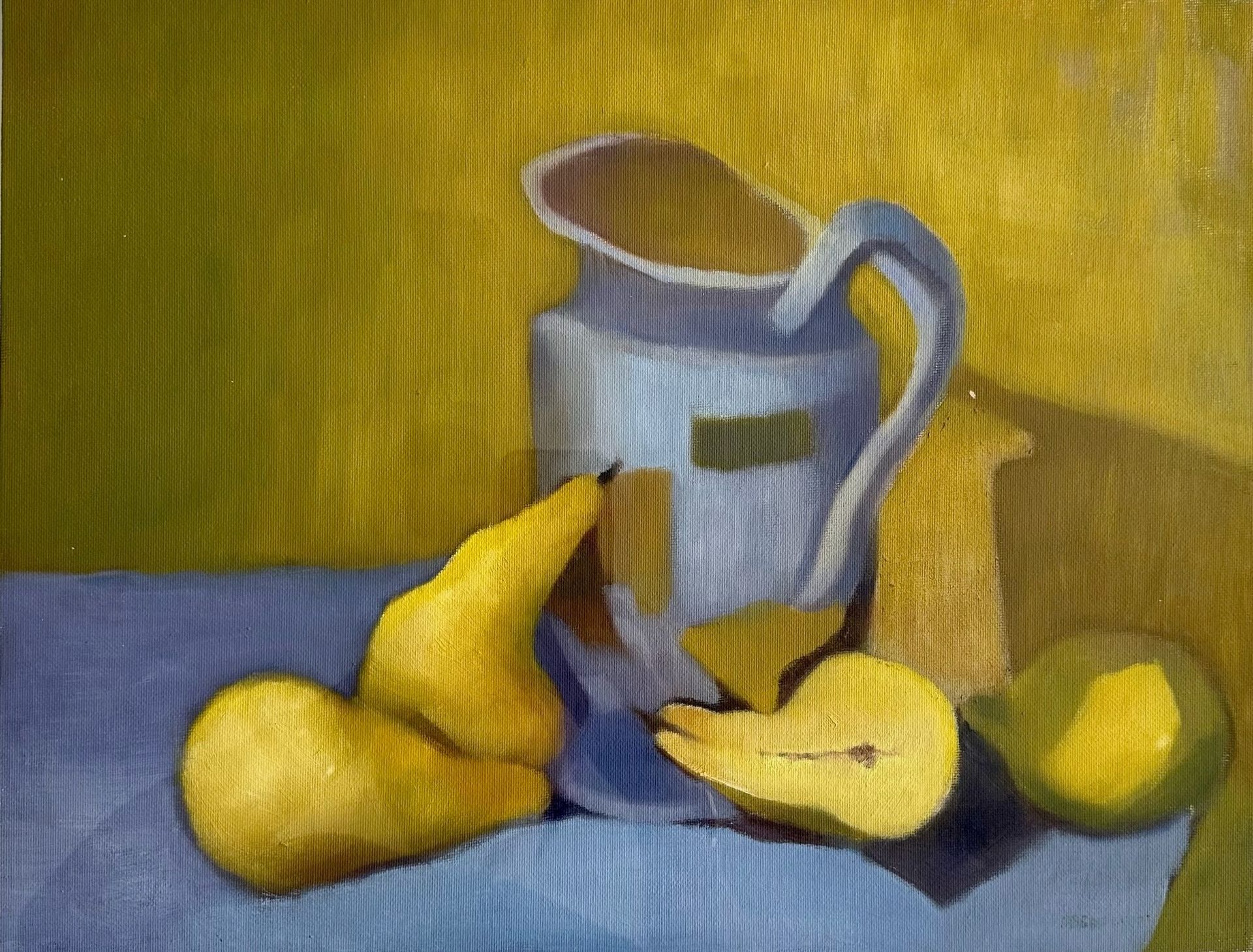 Yellow rubber boots beside a tipped silver mug on a blue floor against a yellow wall.