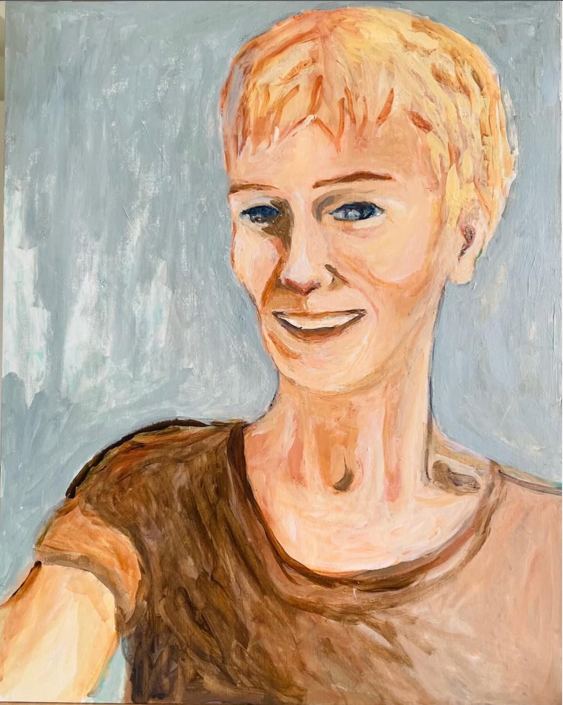 Portrait painting of a smiling person with short blond hair and a brown shirt on a gray-blue background