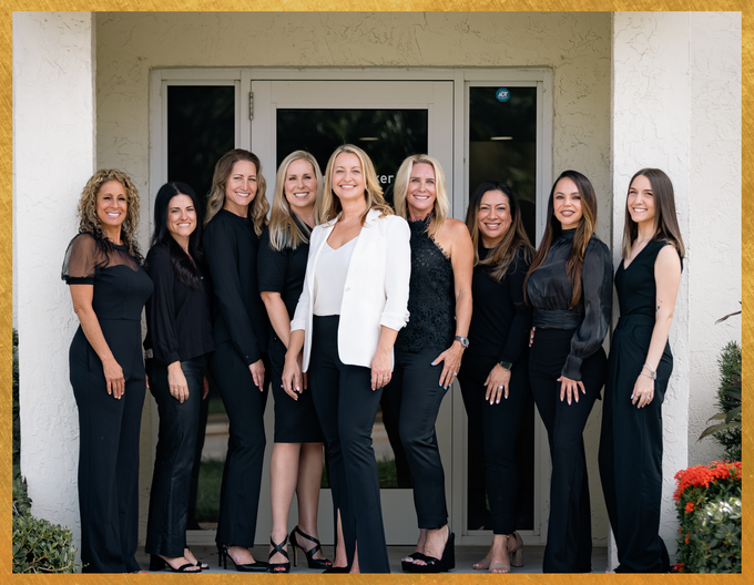 Dr. Amanda Sindledecker and her team standing together outside smiling for a picture