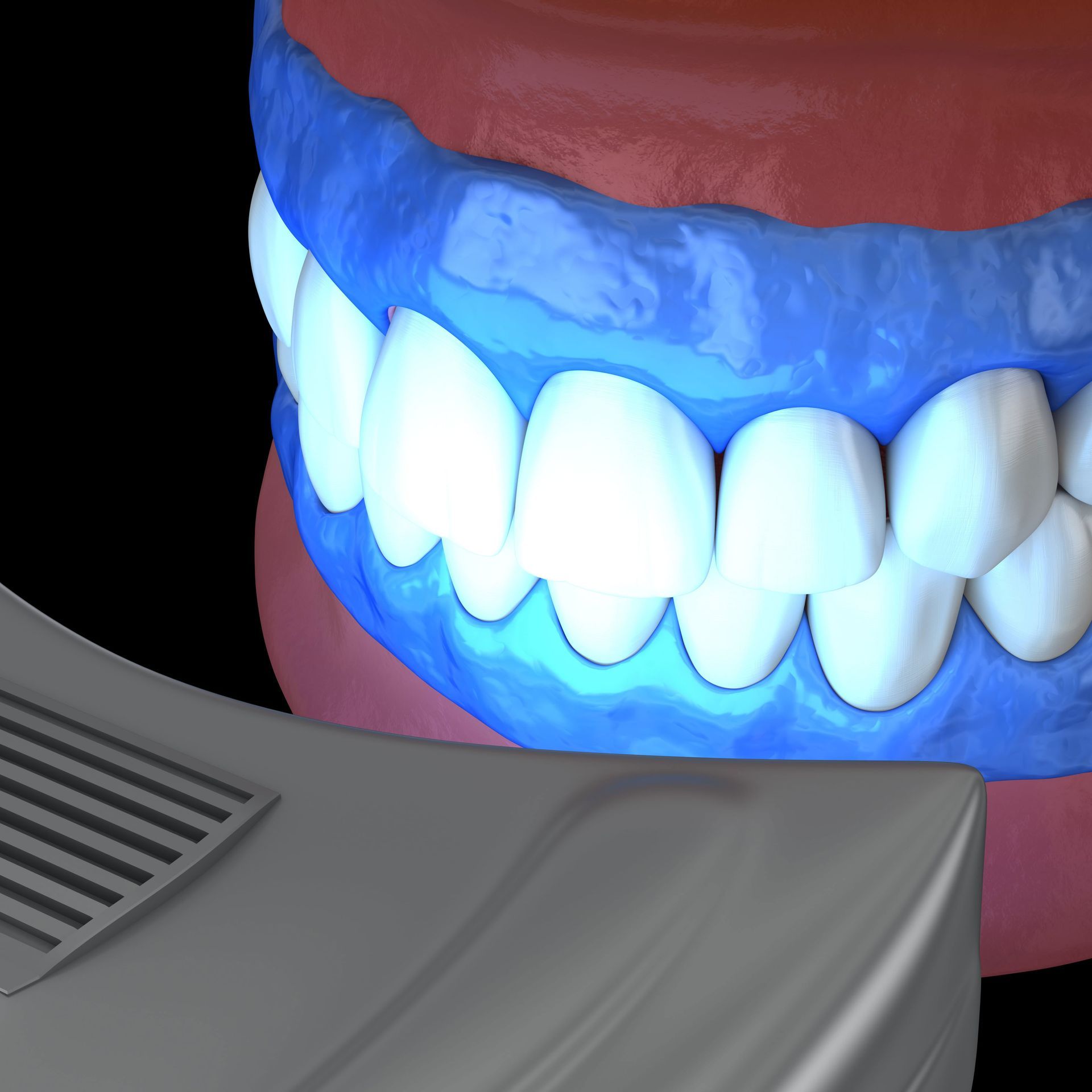 A close up of a mouth with a blue light