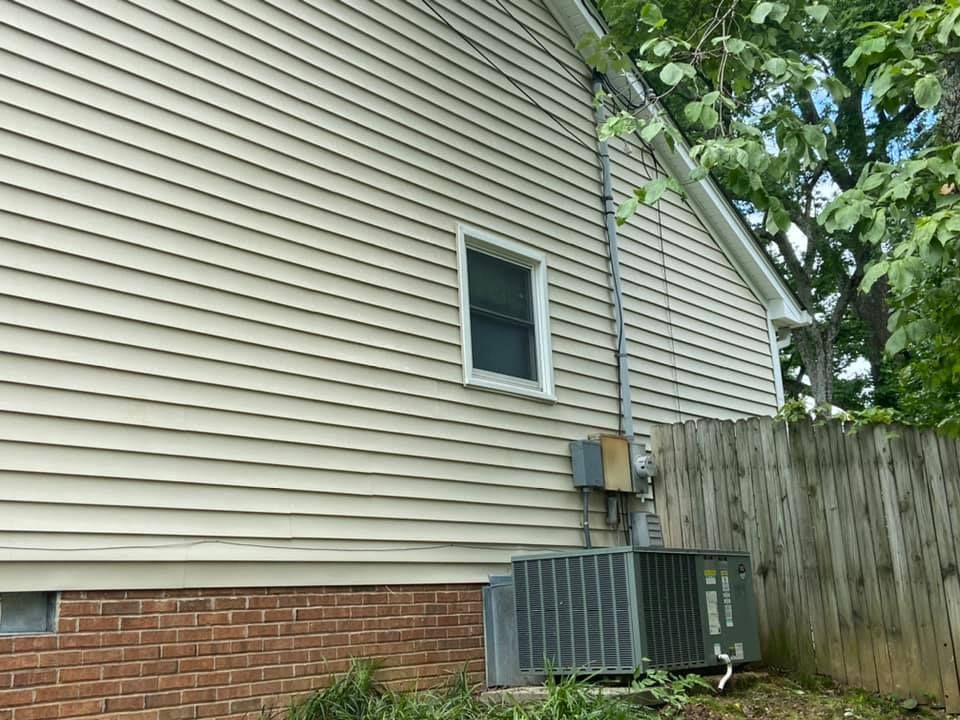 Freshly cleaned home siding in Lebanon, TN, highlighting expert soft washing services for exterior surfaces.