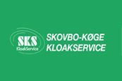 The logo for skovbo-koge kloakservice is on a green background.