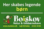 A green sign that says her skabes legende barn