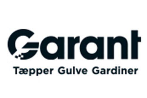 A black and white logo for garant taepper gulve gardiner