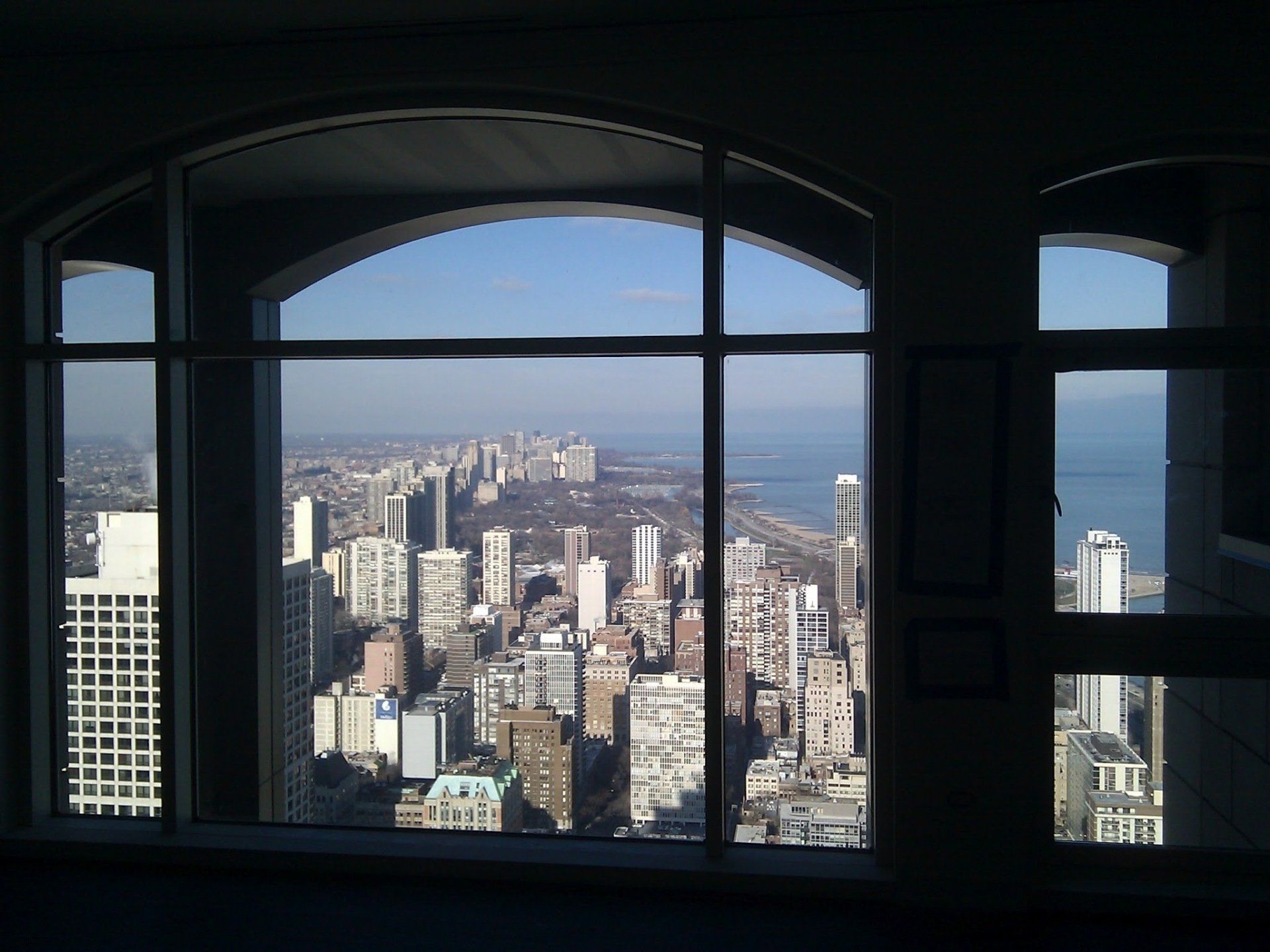 A view of a city from the top of a building