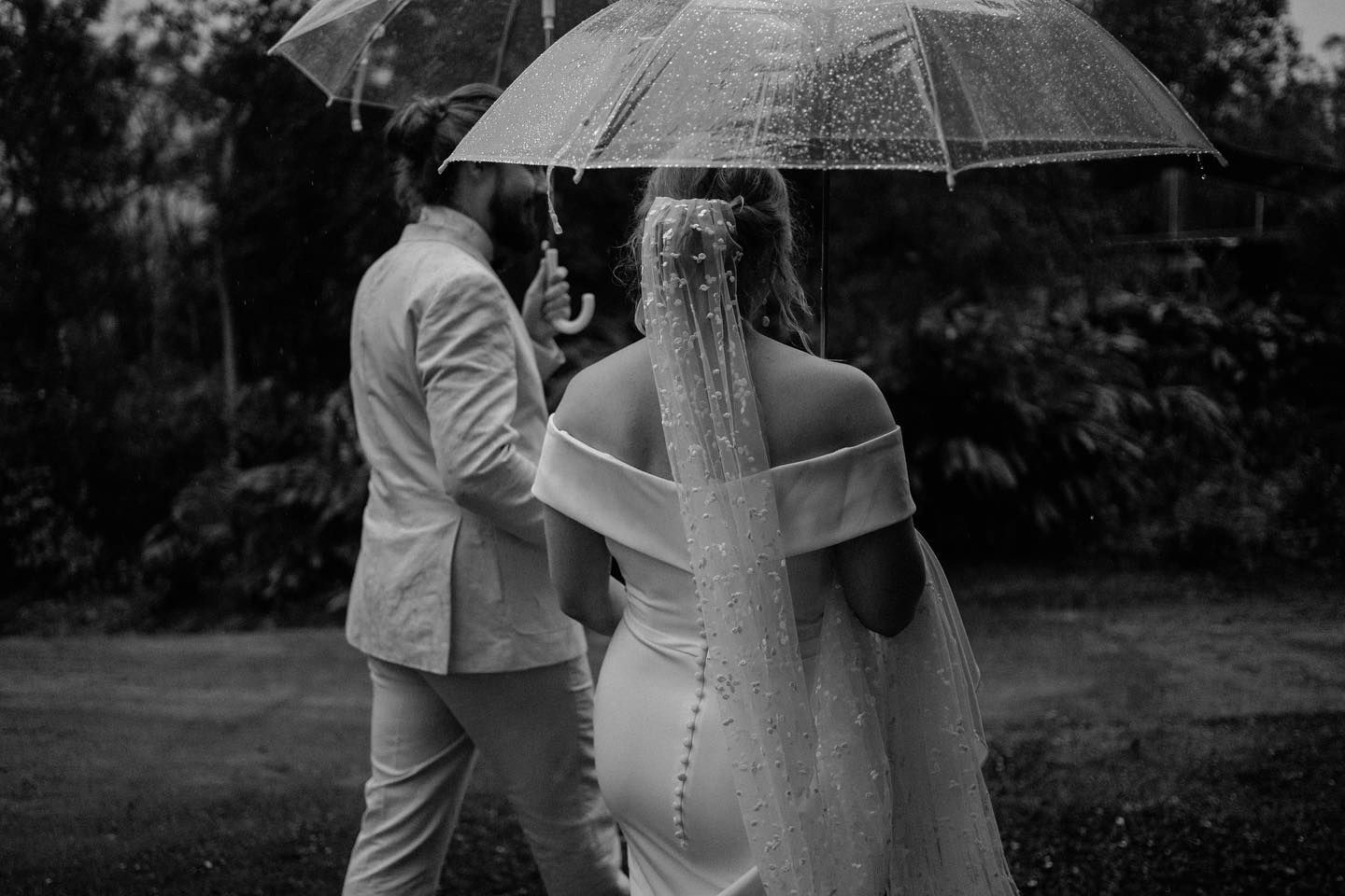 Black & White Image of Bride & Groom Walking Away Under an Umbrella — Seed + Salt Photography In Smithtown, NSW