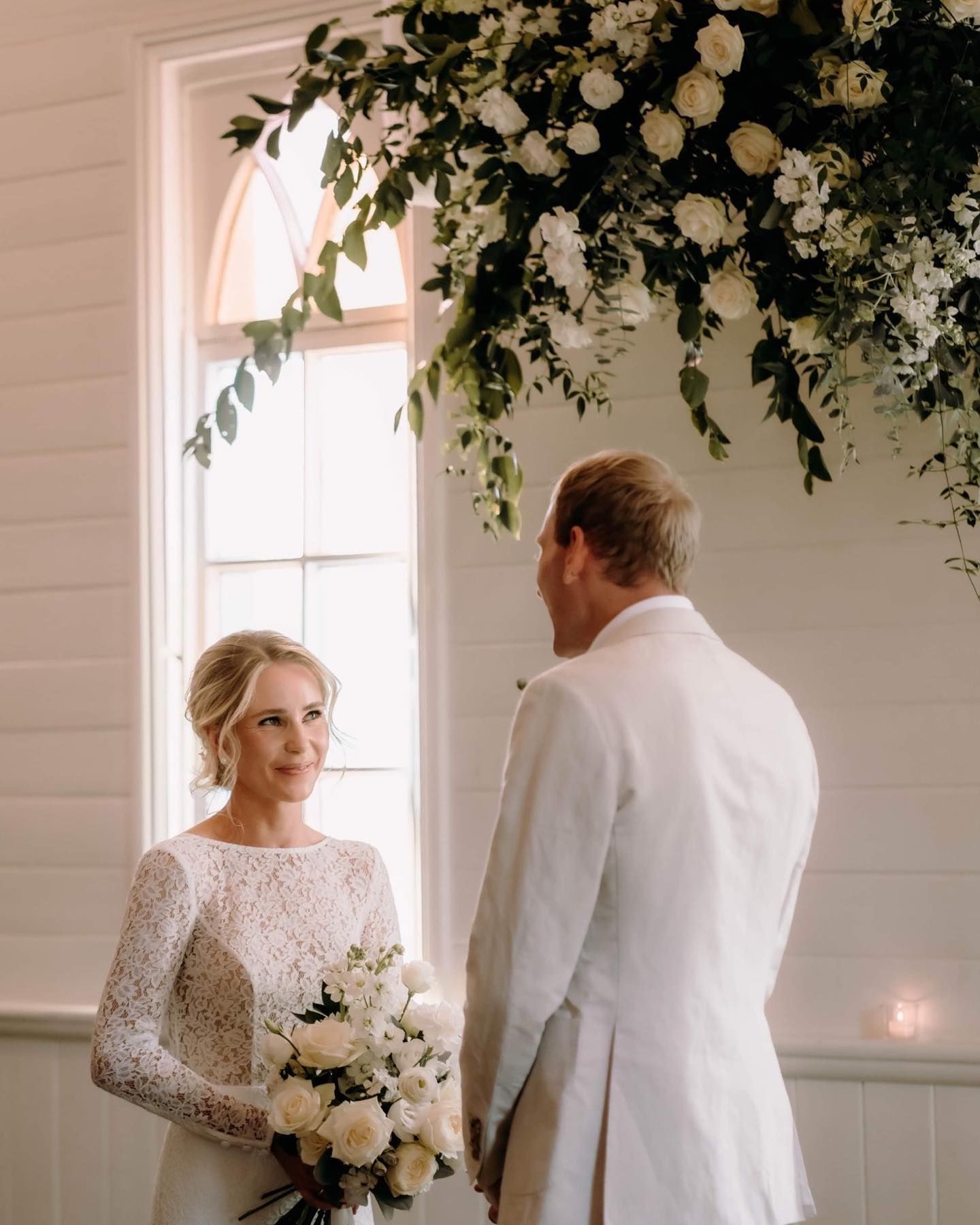 A Group of People Are Standing in The Grass Talking to Each Other — Seed + Salt Photography In Kempsey, NSW