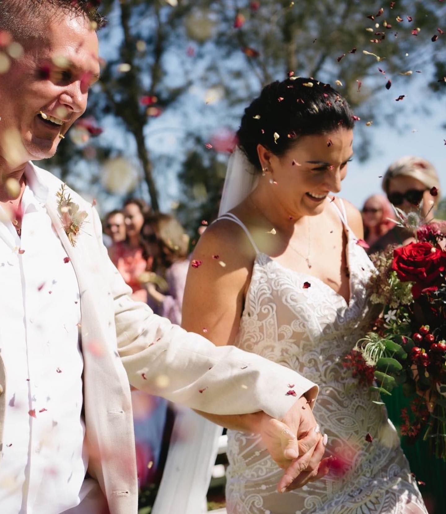A Bride and Groom Are Standing on A Set of Stairs — Seed + Salt Photography In Taree, NSW