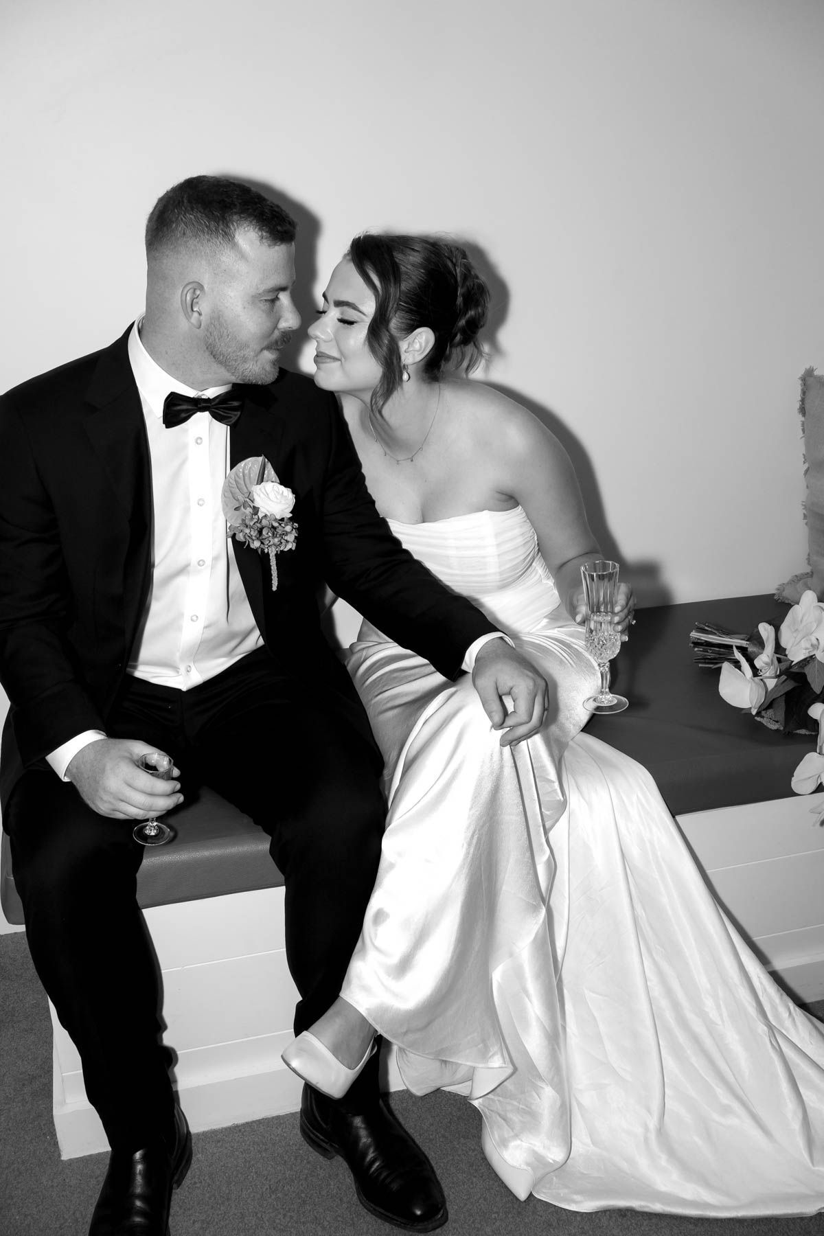 A Wedding Cake  Being Cut with A Knife— Seed + Salt Photography In Smithtown, NSW