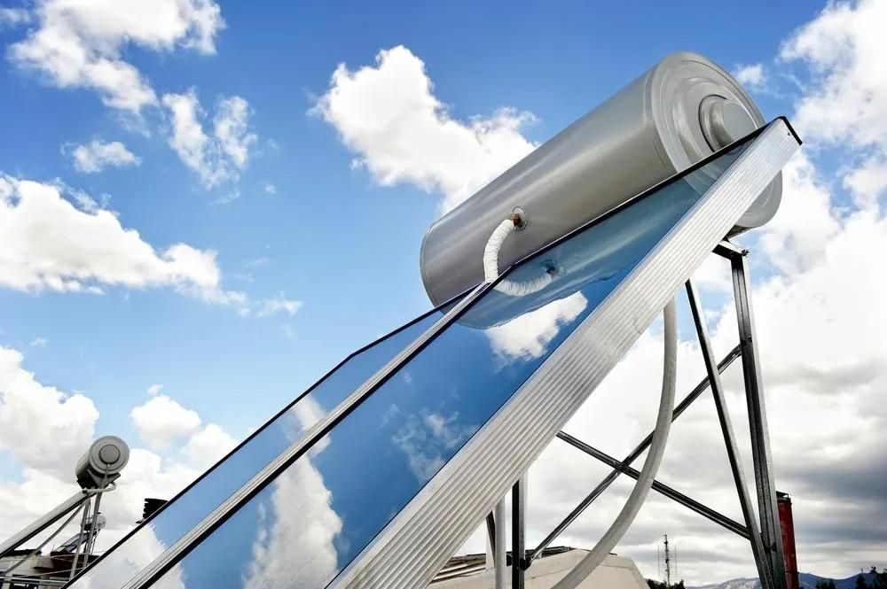A Solar Water Heater with A Blue Sky in The Background — Gillespie Plumbing in Grafton, NSW