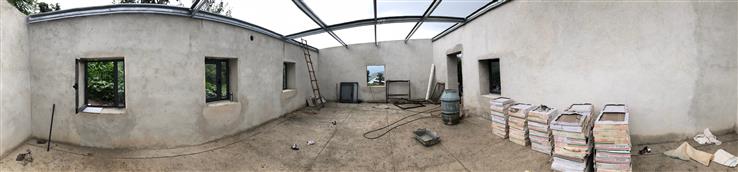 A panoramic view of a building under construction.