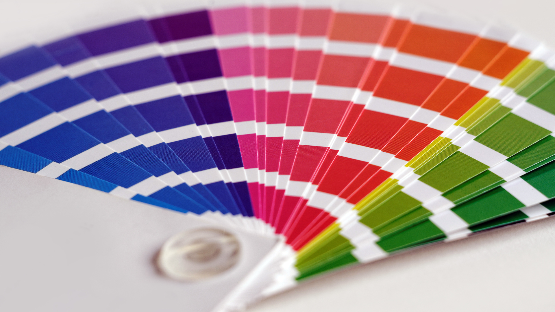 A fan with many different colors on it