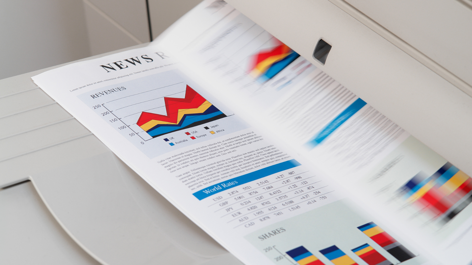 A printer is printing a piece of paper with a graph on it.