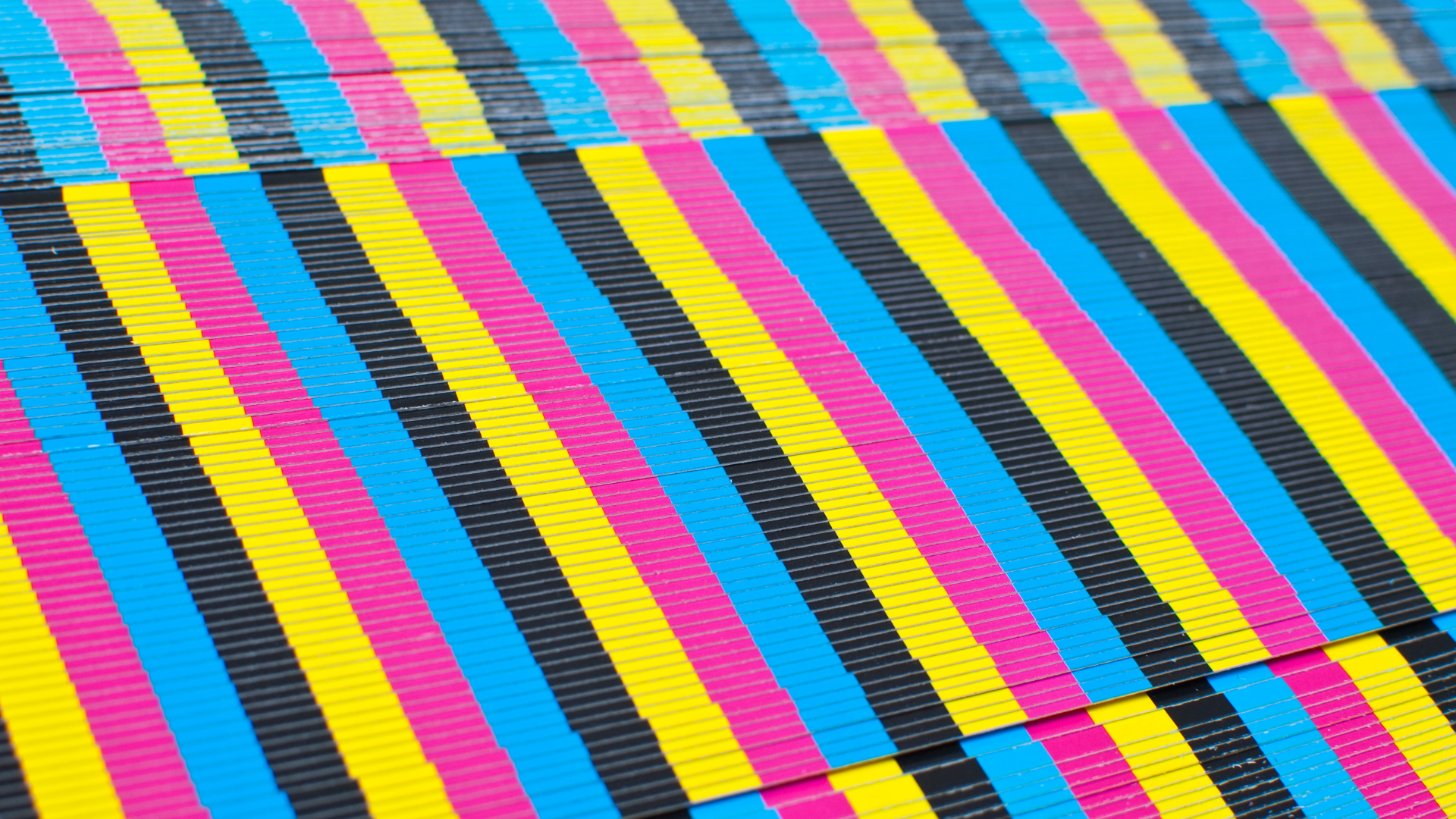 A close up of a colorful striped fabric.