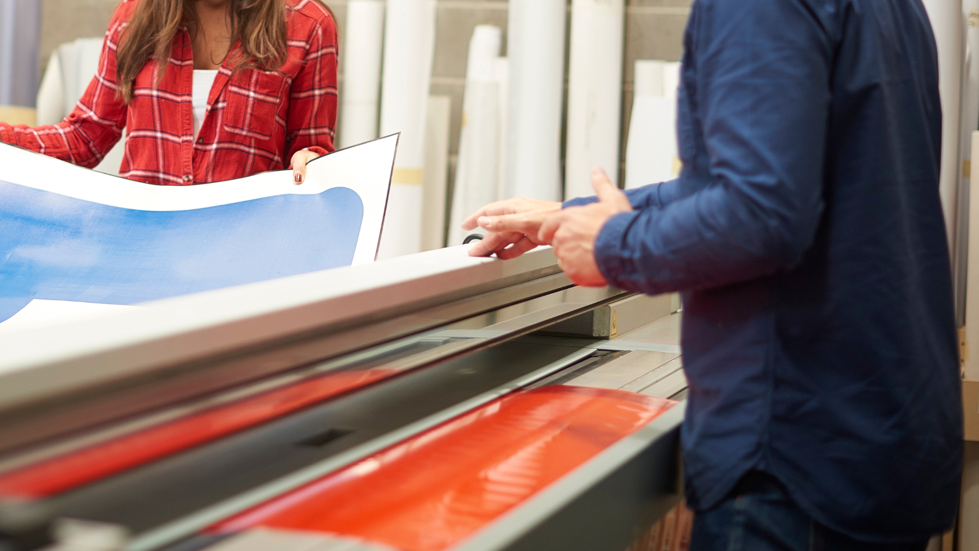 A laptop computer is sitting on top of a white desk.