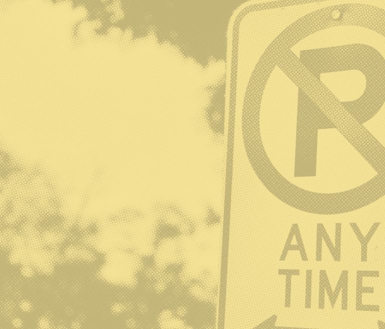 A No parking sign | Joyce Automotive and Towing