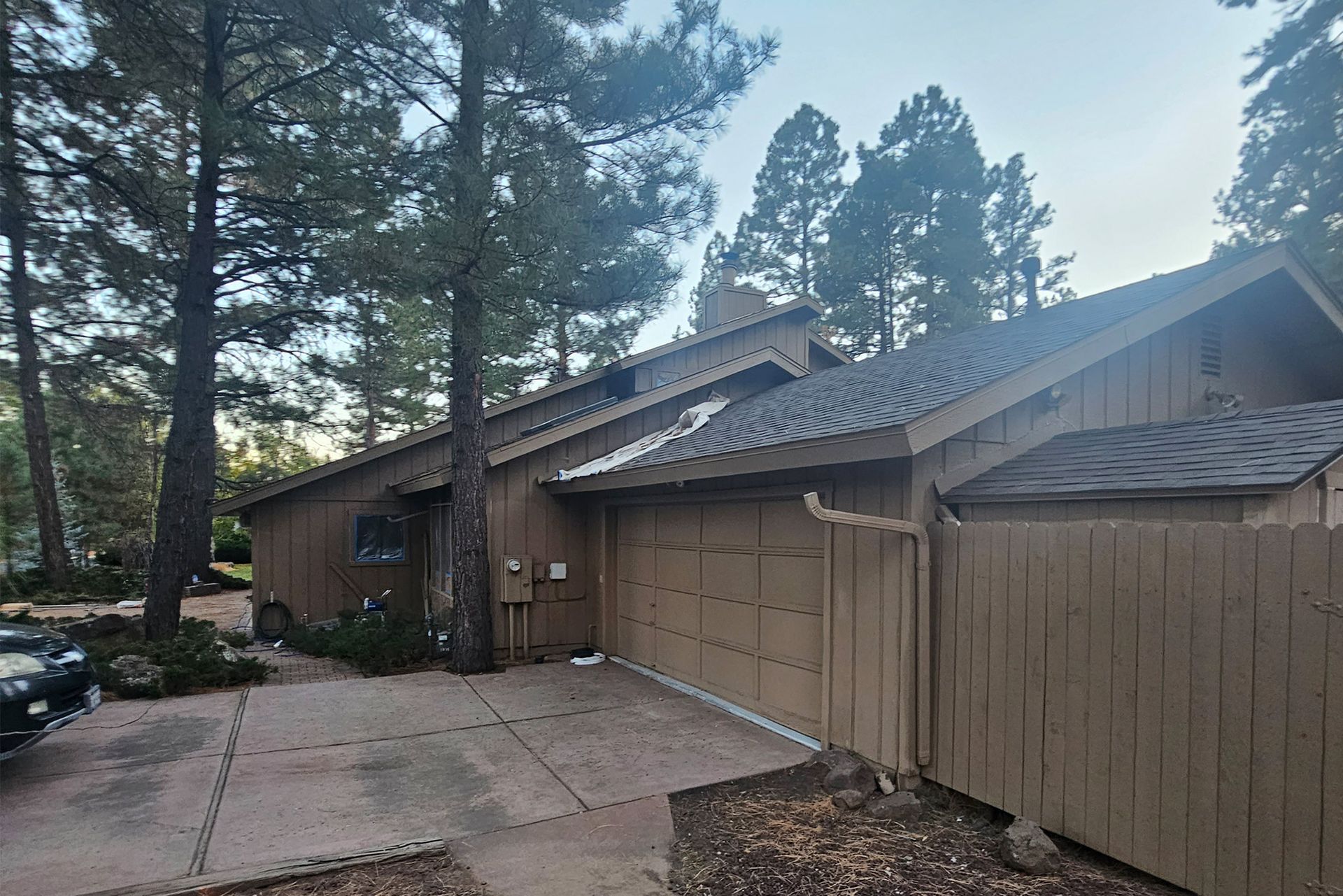 House With a Garage and a Car Parked — Flagstaff, AZ — Northern Arizona Building and Investments