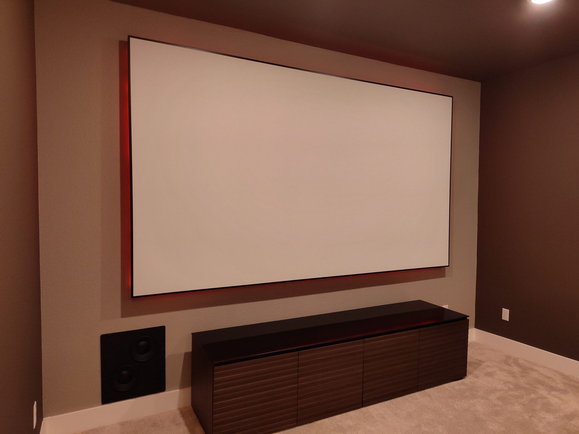 Home Theater With a Large White Screen on the Wall — Austin, TX — ACA Electronics Inc.