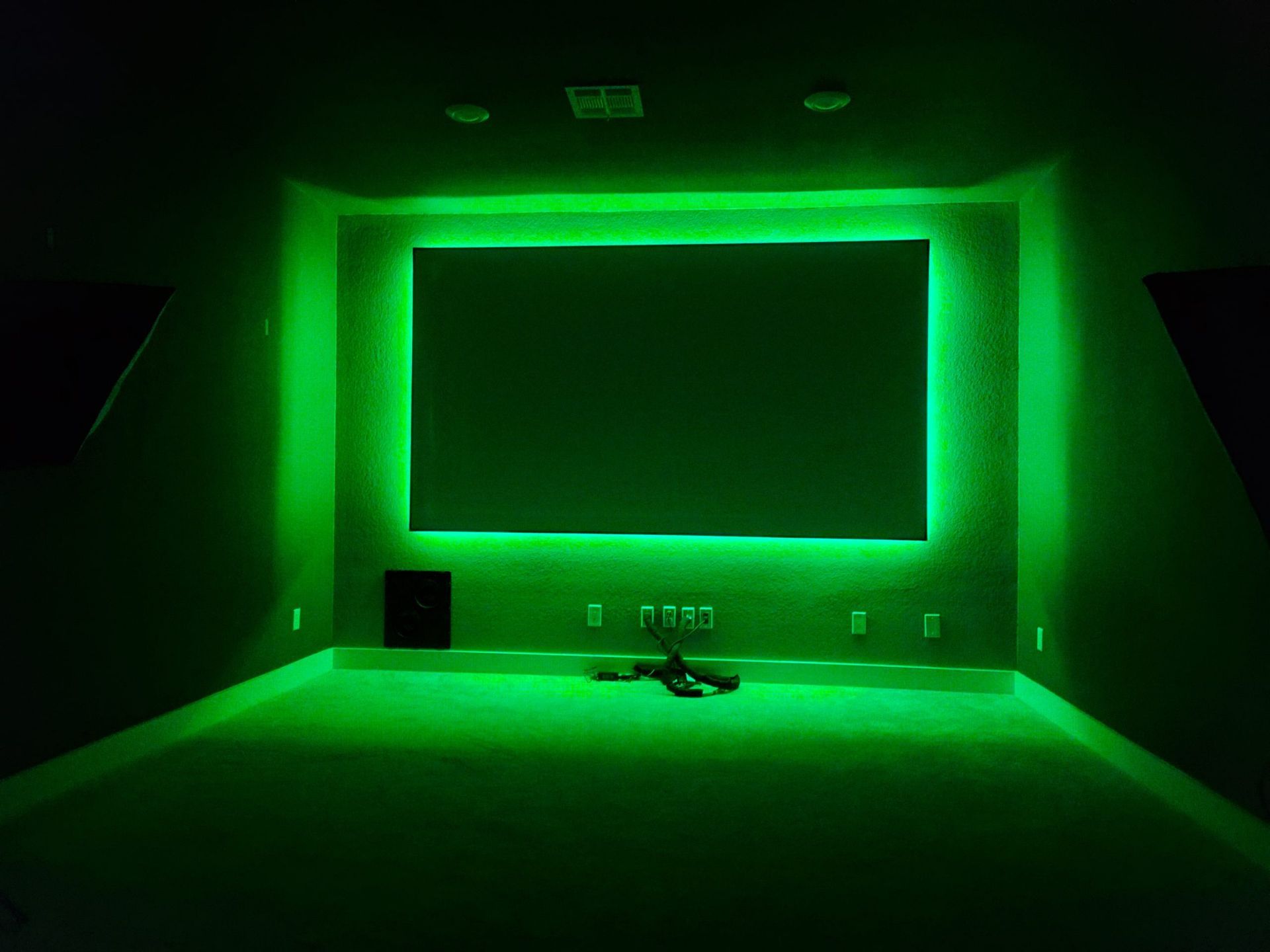 Room With a Large Screen and Green Lights — Austin, TX — ACA Electronics Inc.