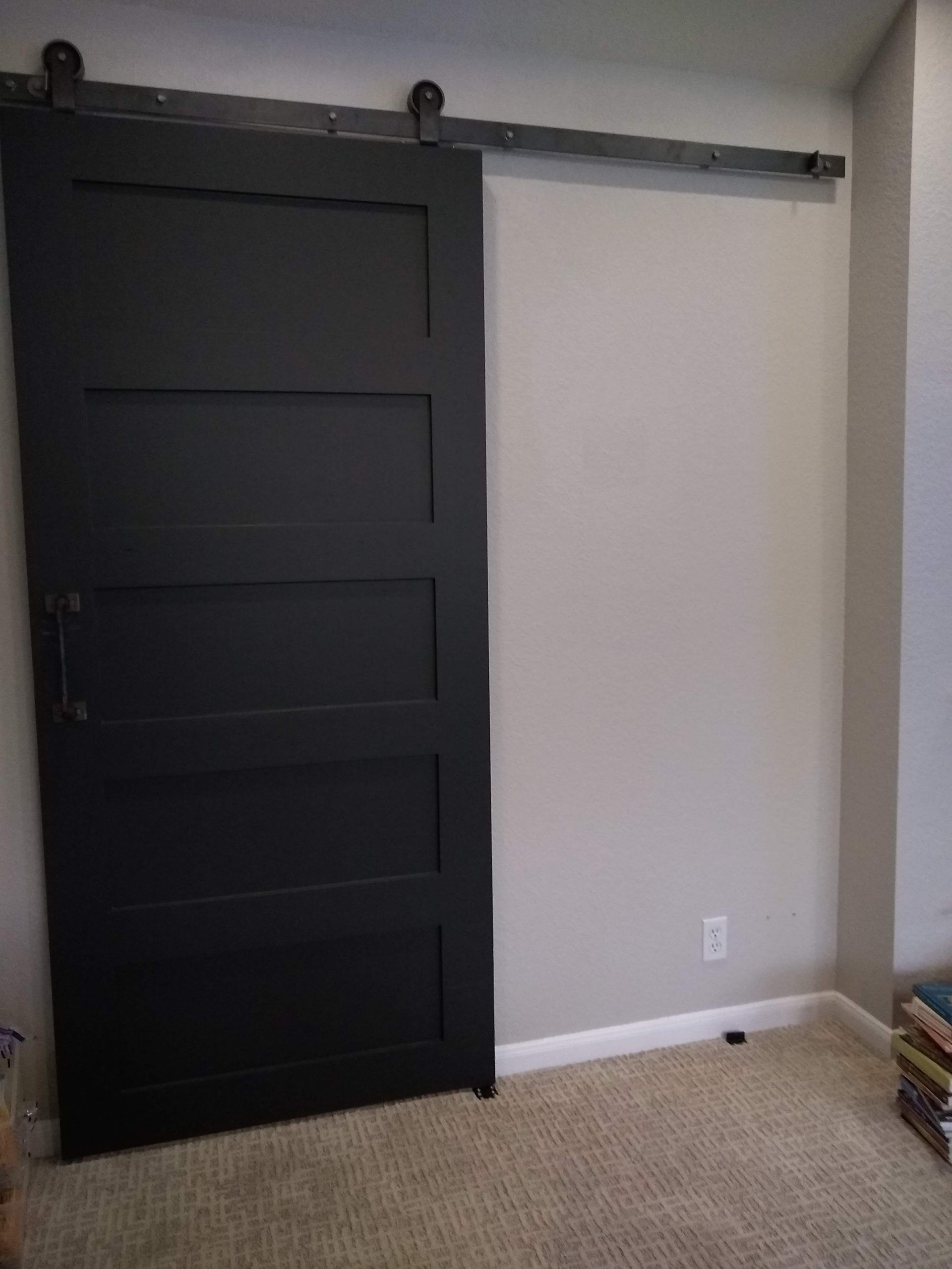 Black Sliding Barn Door — Austin, TX — ACA Electronics Inc.