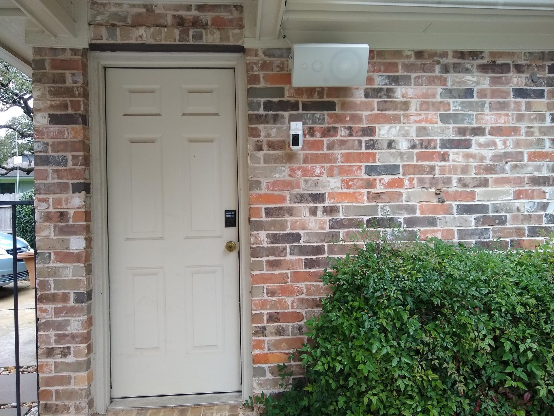 White Door is on a Brick Wall — Austin, TX — ACA Electronics Inc.