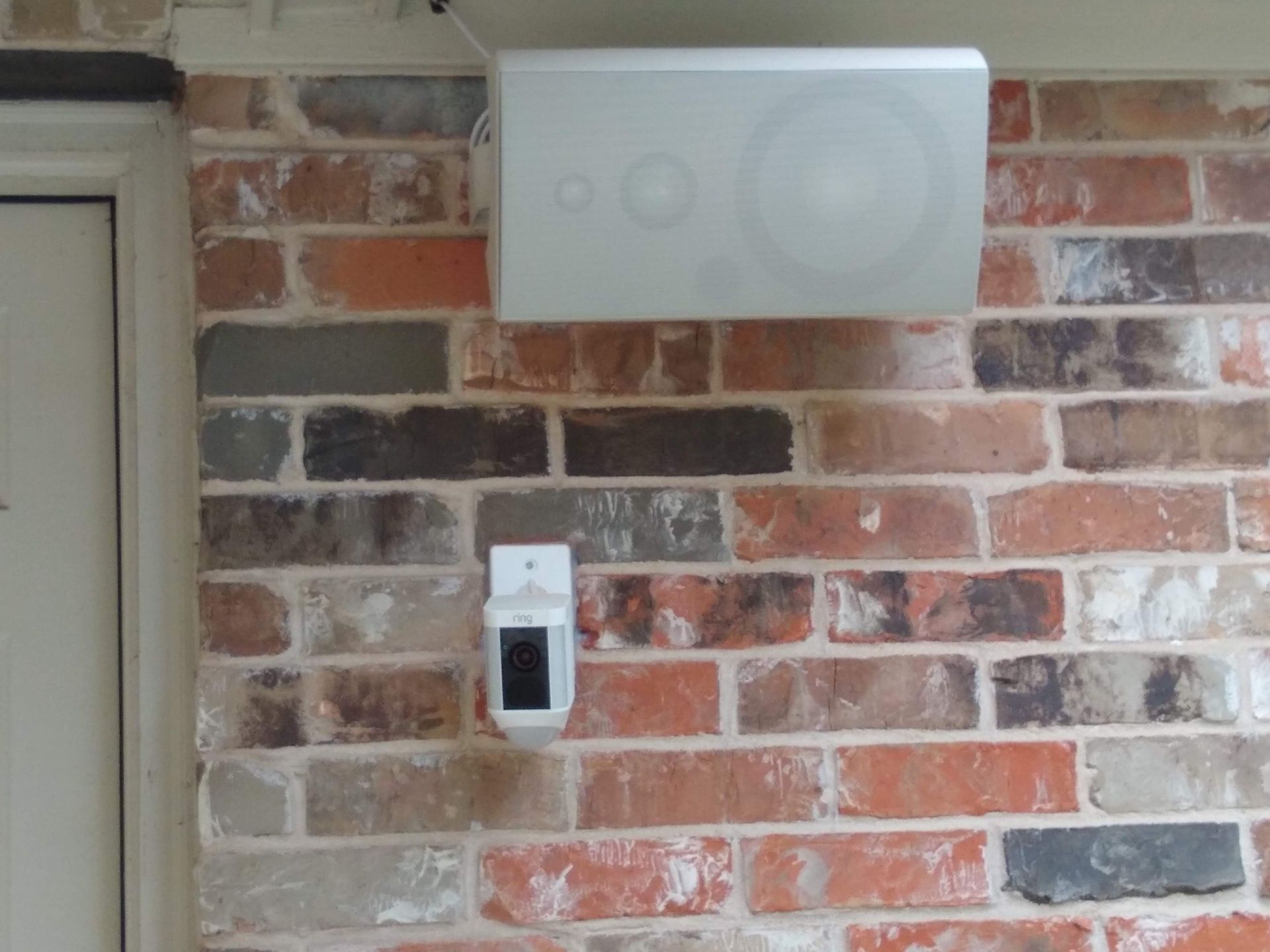 Brick Wall With a White Box on It — Austin, TX — ACA Electronics Inc.