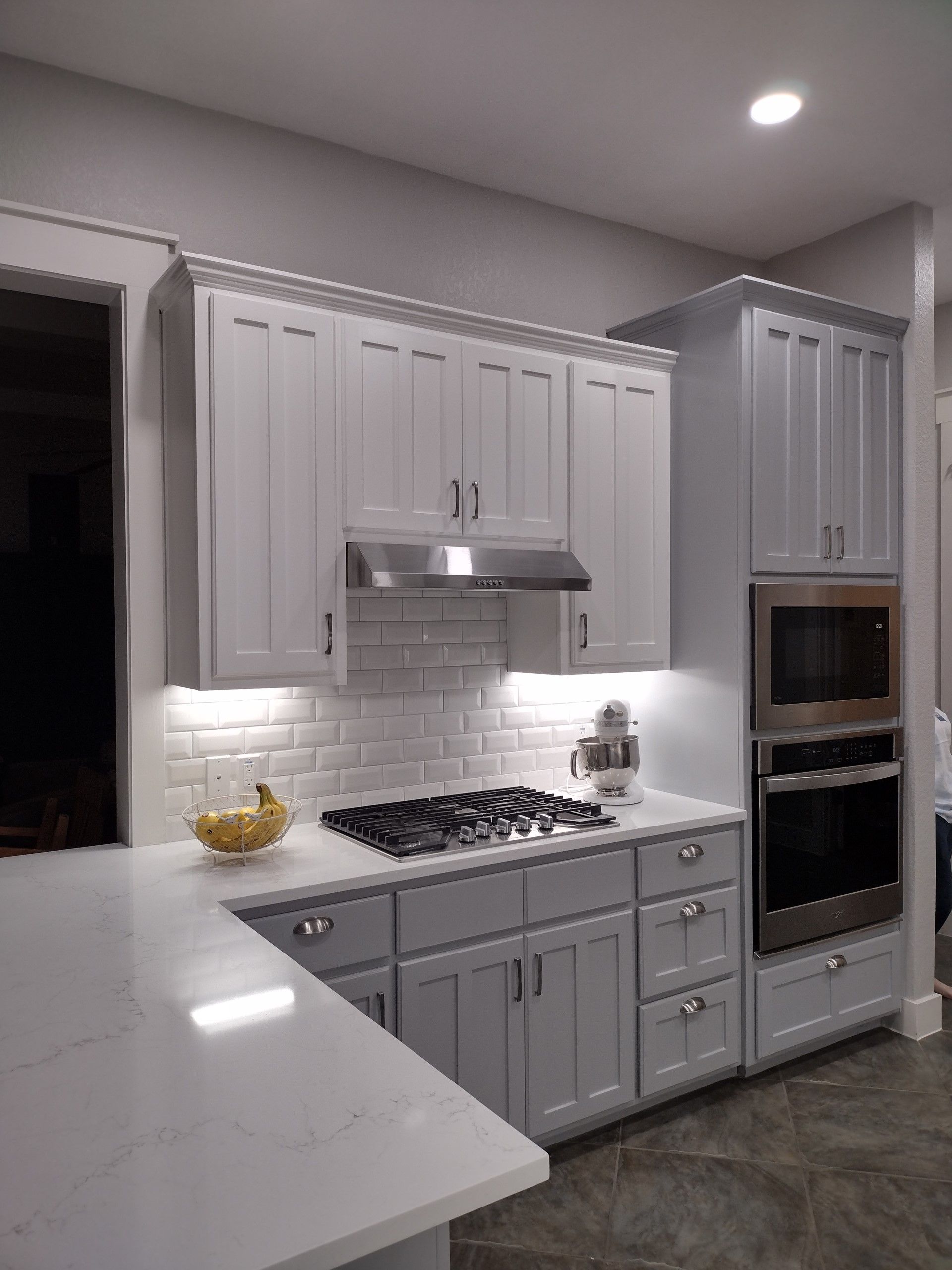 Kitchen With White Cabinets and Stove Top Oven — Austin, TX — ACA Electronics Inc.