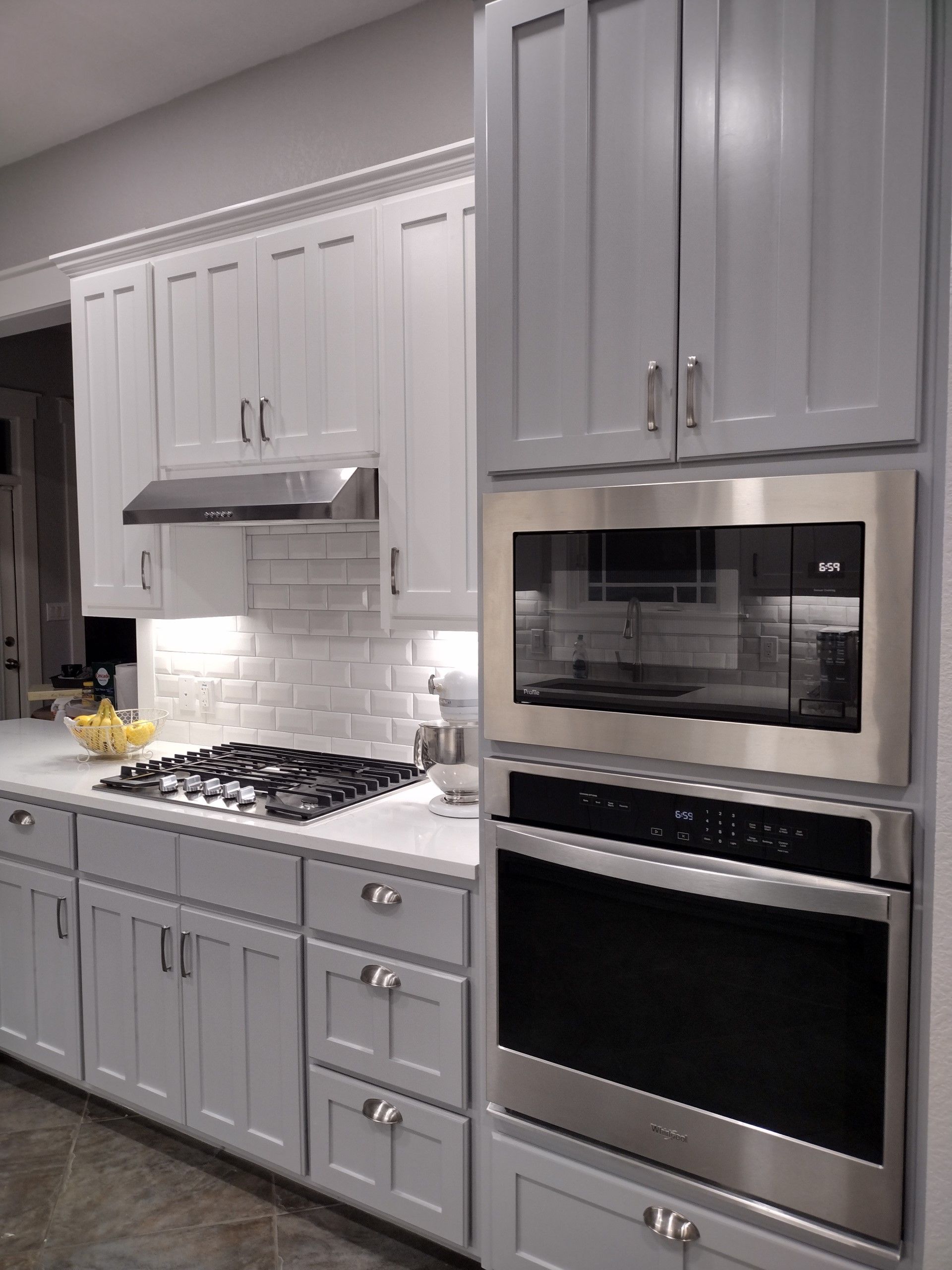 Kitchen With White Cabinets and Stainless Steel Appliances — Austin, TX — ACA Electronics Inc.