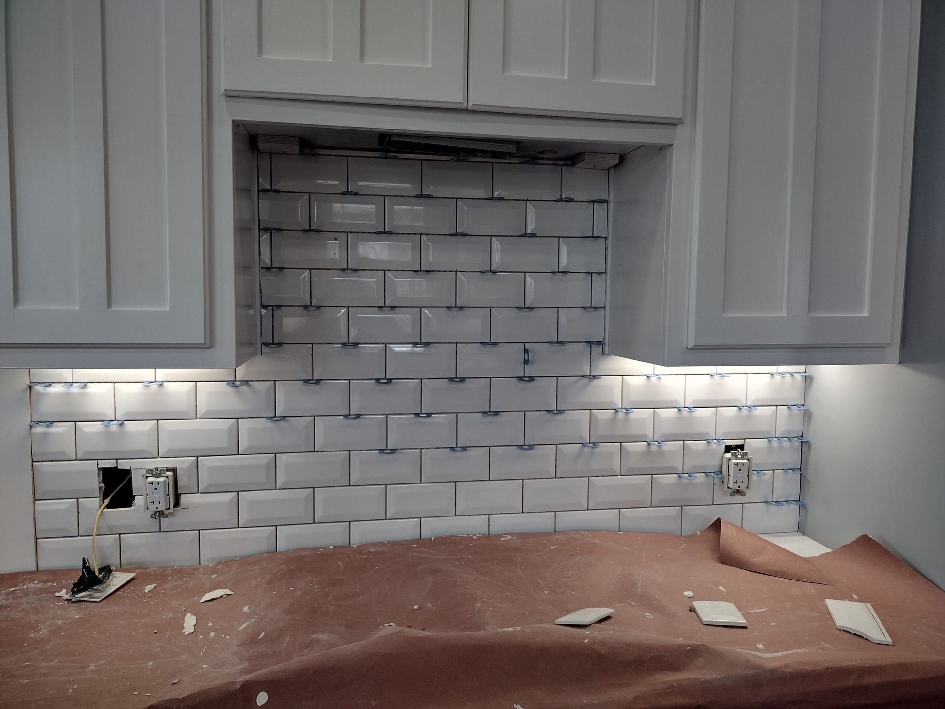 Kitchen With White Cabinets and White Subway Tiles — Austin, TX — ACA Electronics Inc.