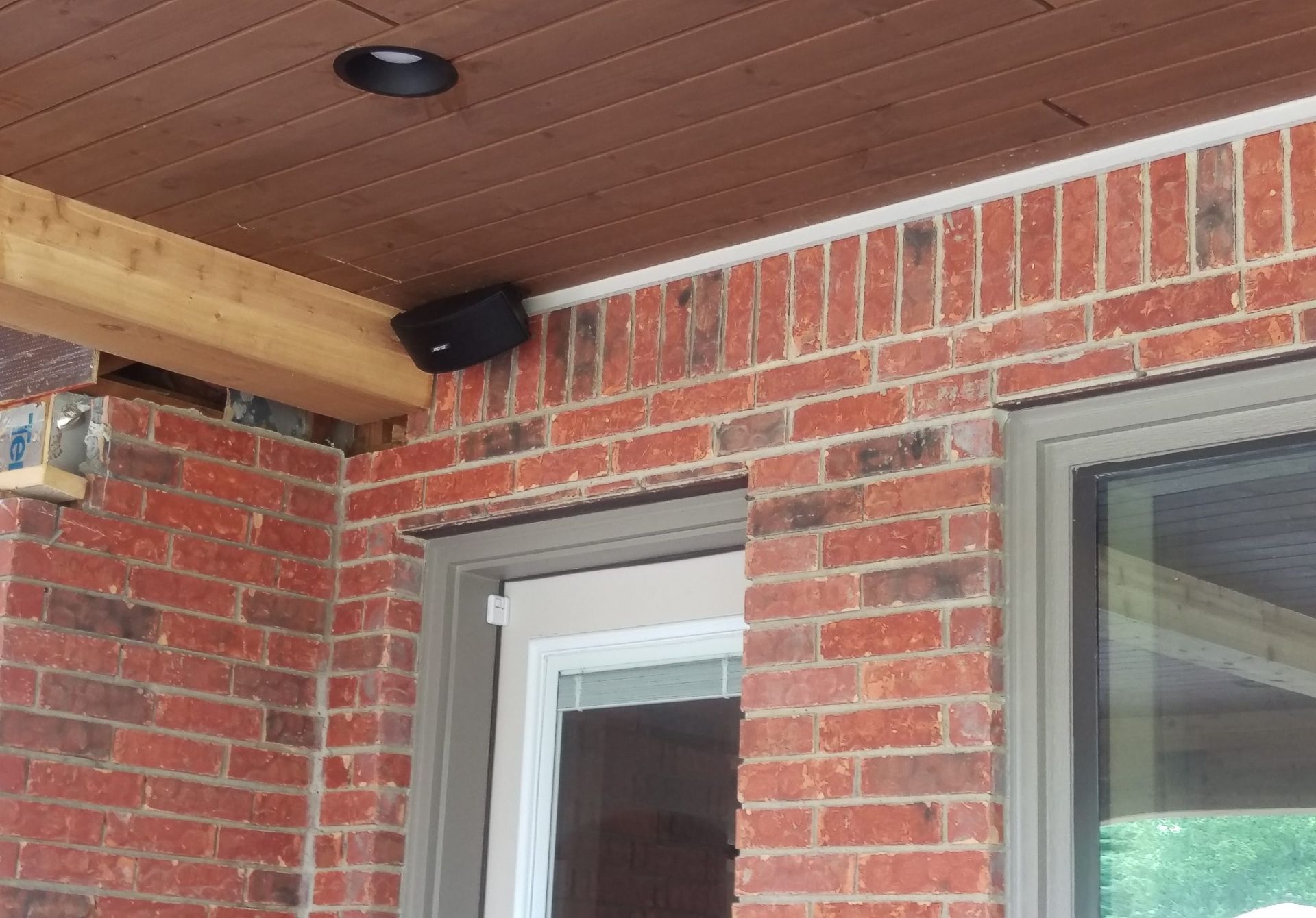 Brick Building With a White Door — Austin, TX — ACA Electronics Inc.