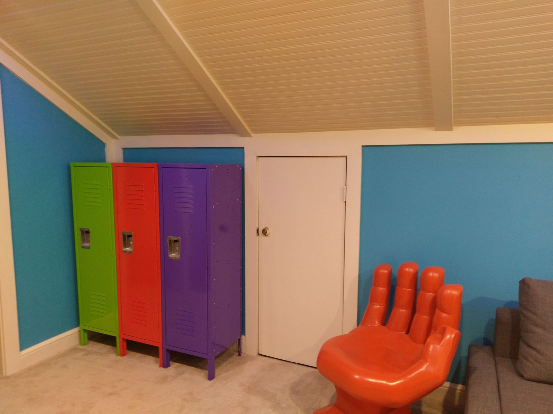 Room With Colorful Lockers and a Chair — Austin, TX — ACA Electronics Inc.