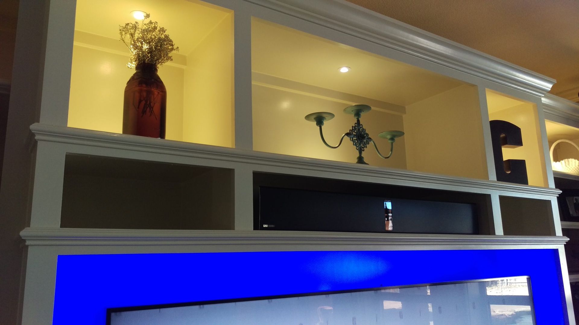 Living Room With a Blue Light Behind the TV — Austin, TX — ACA Electronics Inc.