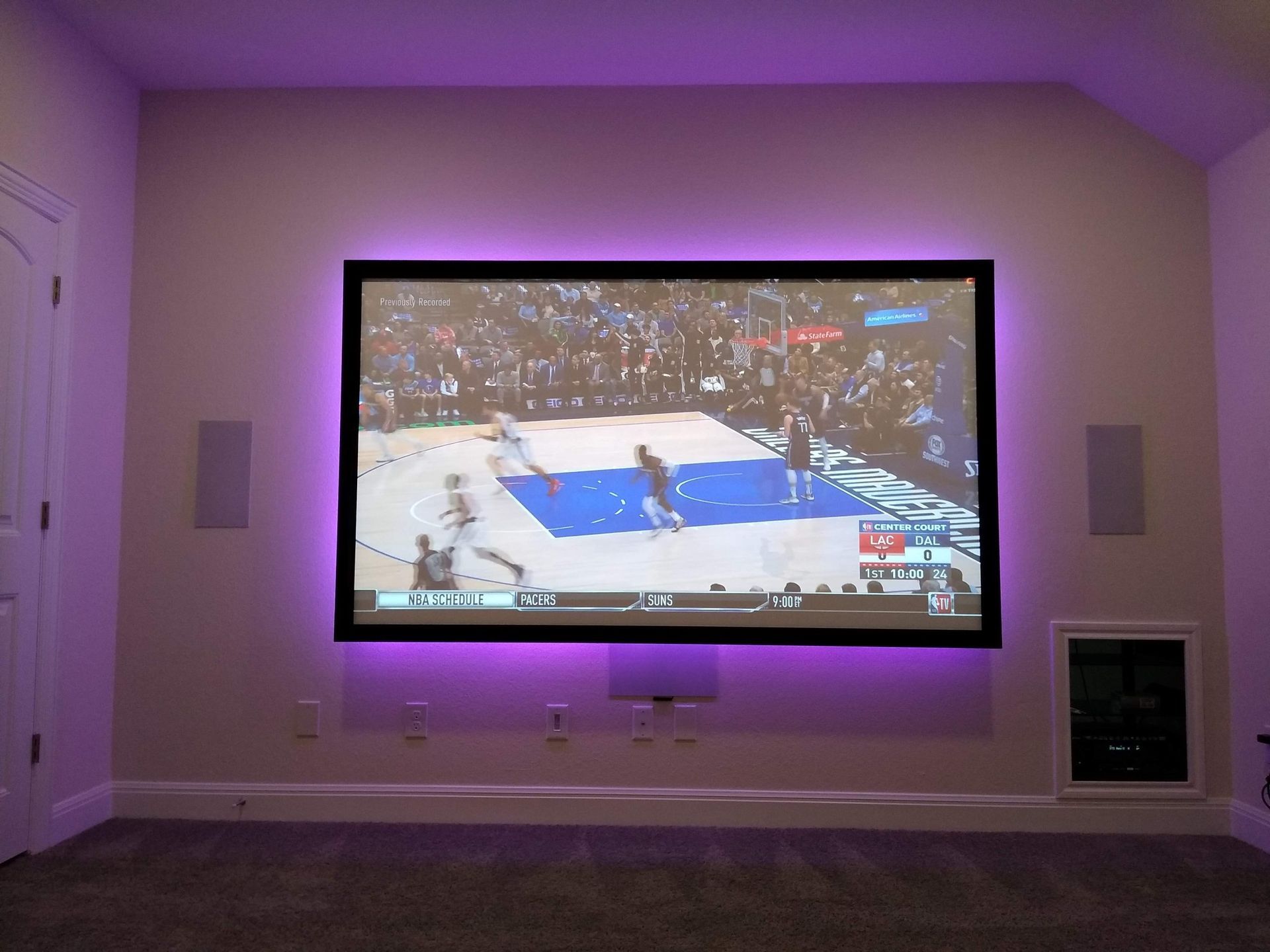 Basketball Game is Being Played on a Flat Screen TV — Austin, TX — ACA Electronics Inc.