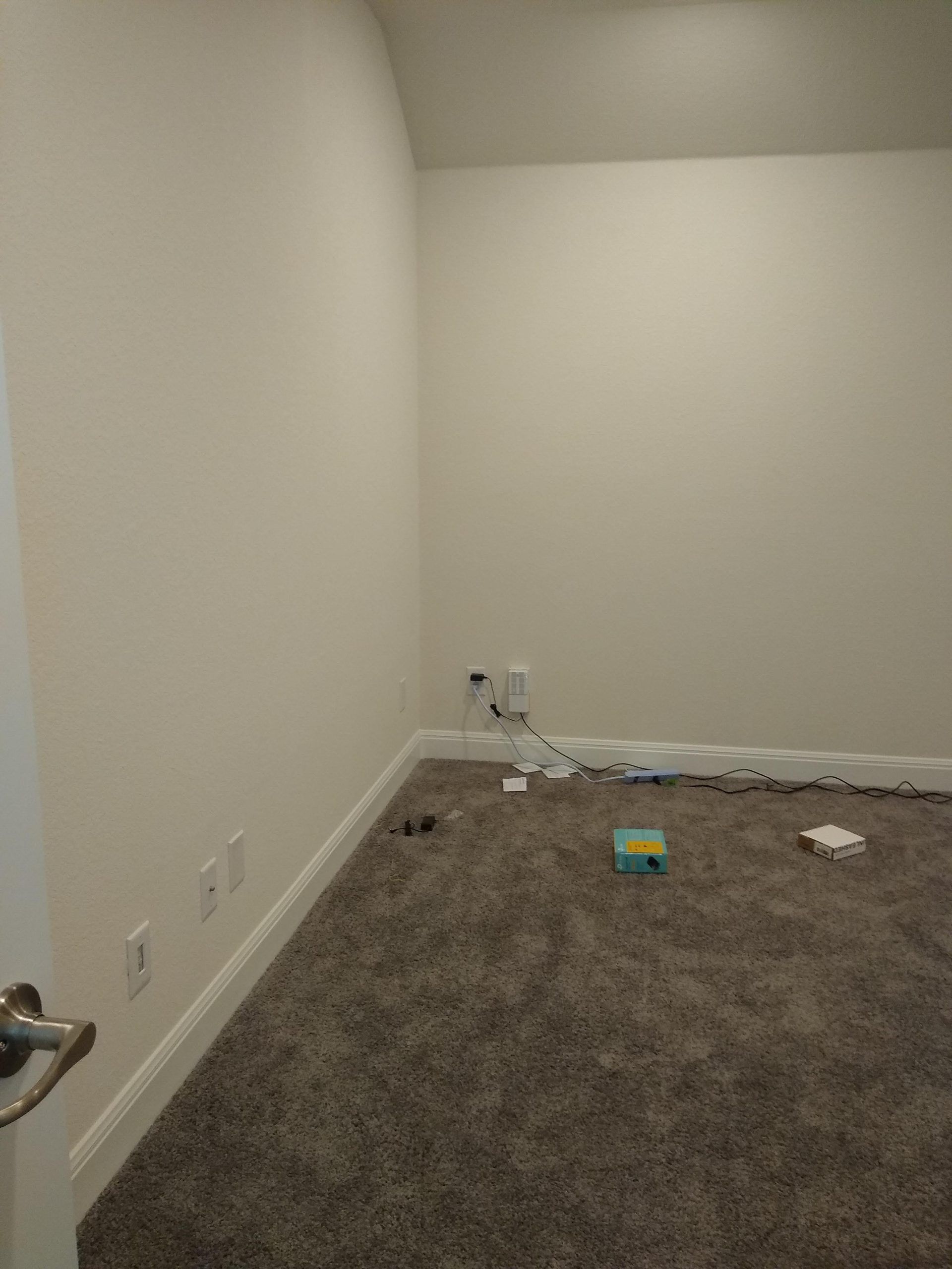 Empty Room With a Carpeted Floor and White Walls — Austin, TX — ACA Electronics Inc.