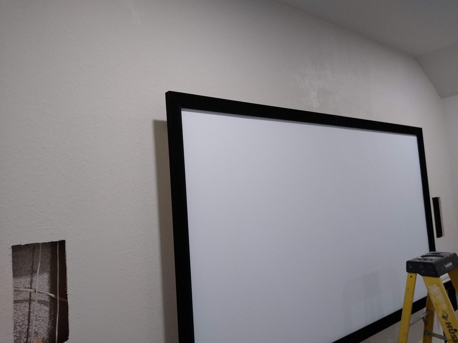 Large White Screen is Hanging — Austin, TX — ACA Electronics Inc.