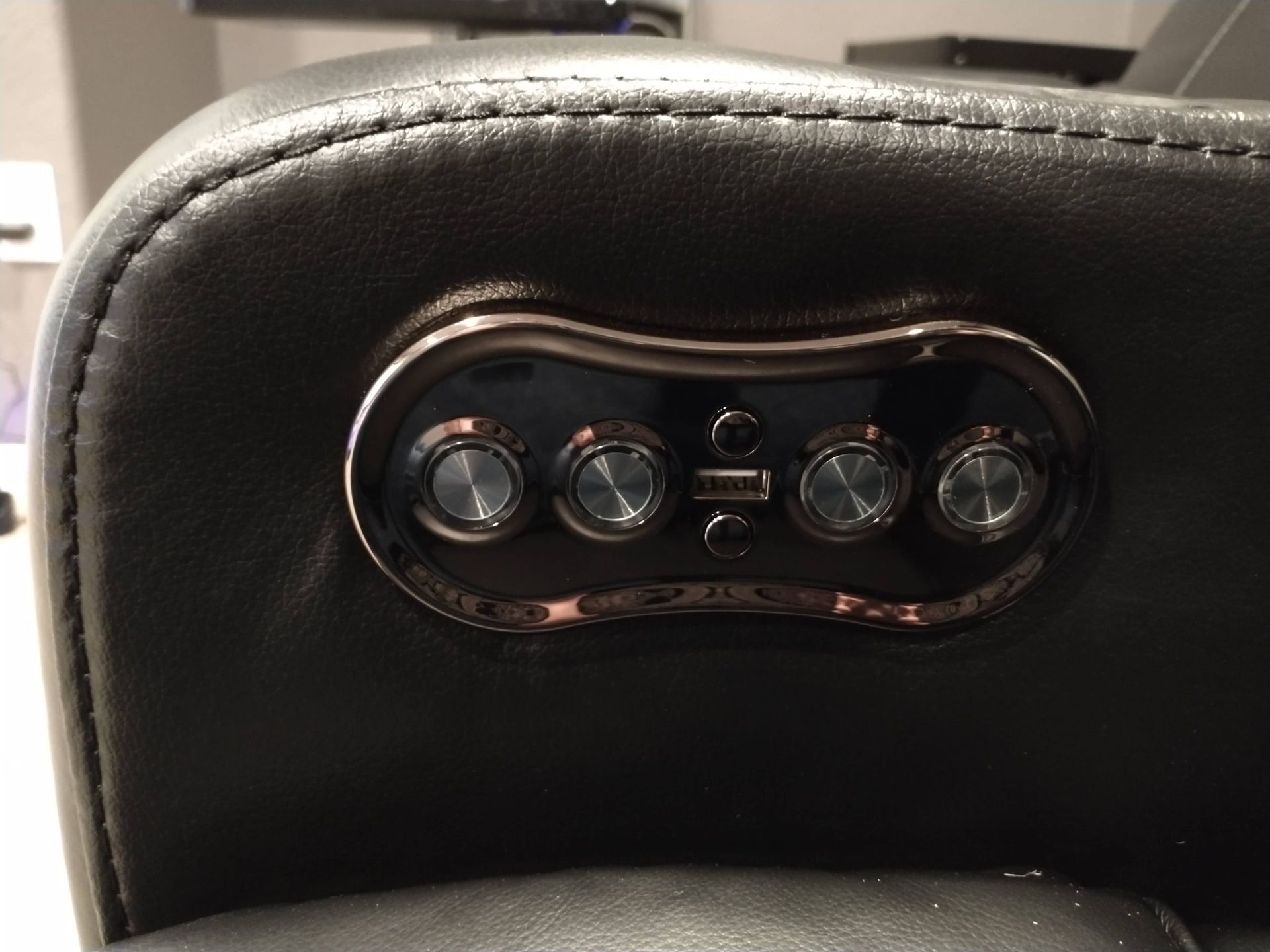 Close Up of a Black Chair With Buttons — Austin, TX — ACA Electronics Inc.
