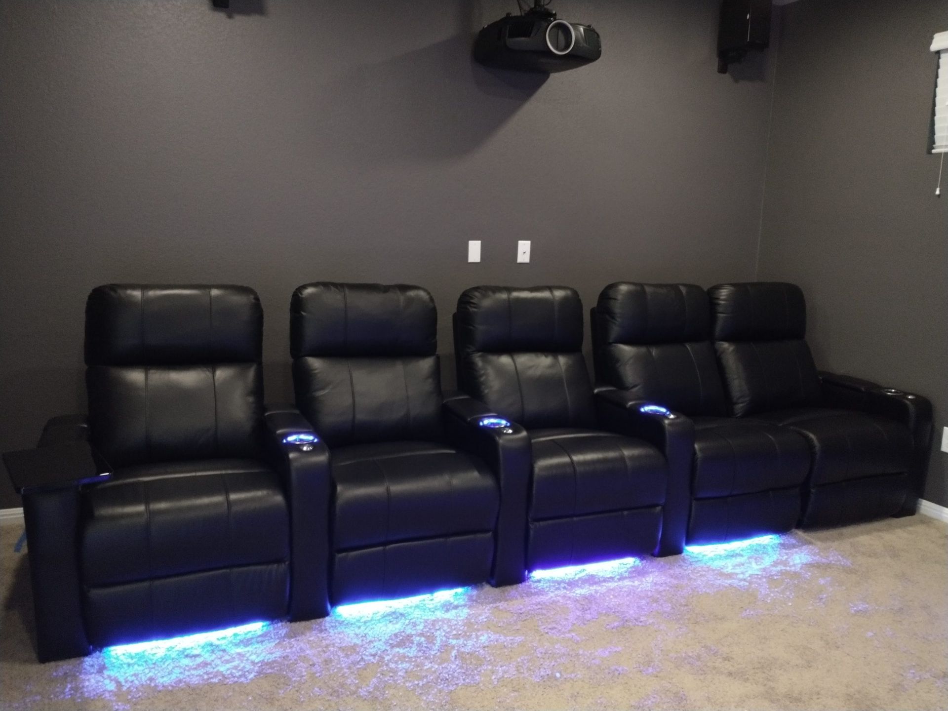 Row of Black Leather Recliner Chairs — Austin, TX — ACA Electronics Inc.