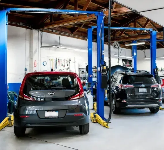 Two cars in a garage  | Berkeley Bob's