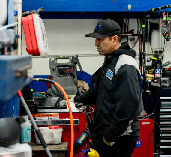 A man is working in a garage | Berkeley Bob's