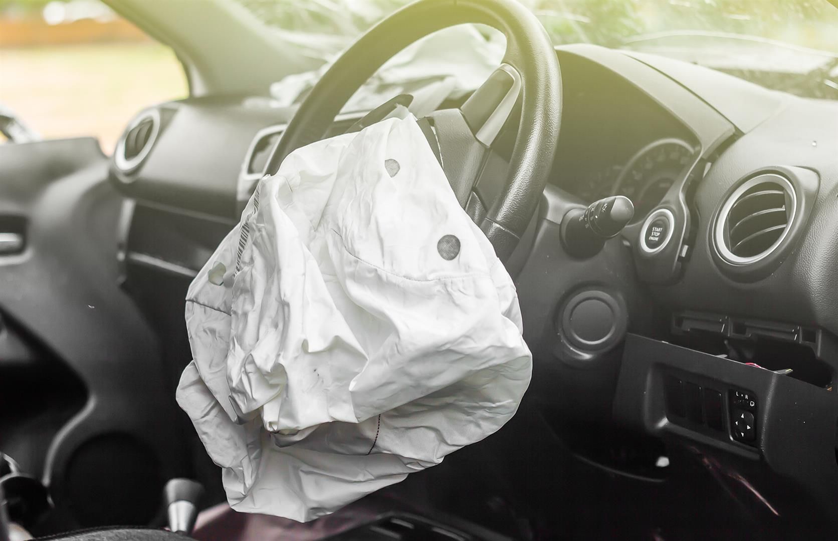 A car with a broken airbag on the steering wheel | Berkeley Bob's