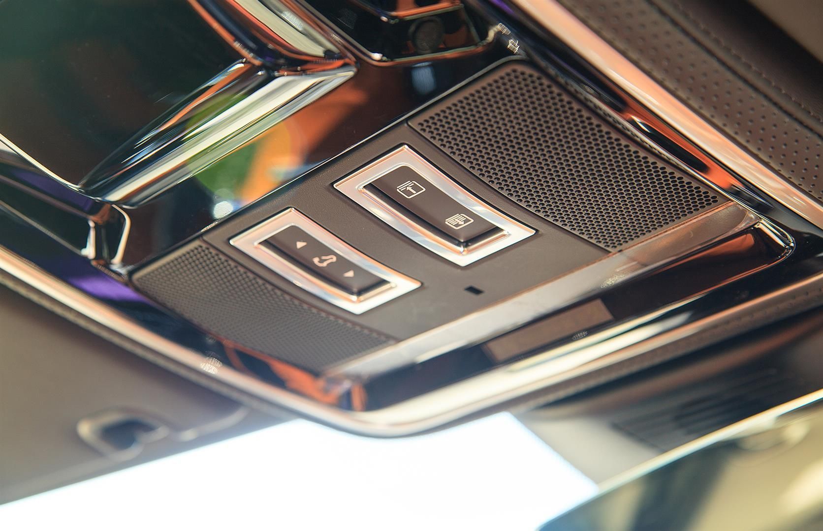 A close up of the ceiling of a car with a speaker | Berkeley Bob's