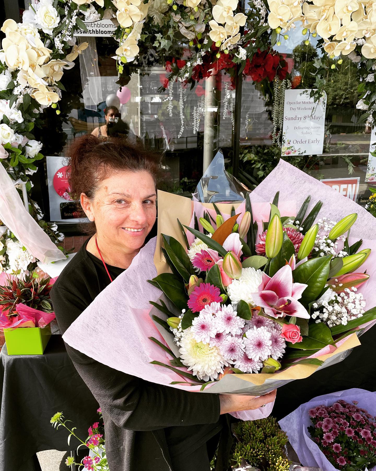 Florist Holding Bouquet — Meadowbank, NSW — Business With Blooms