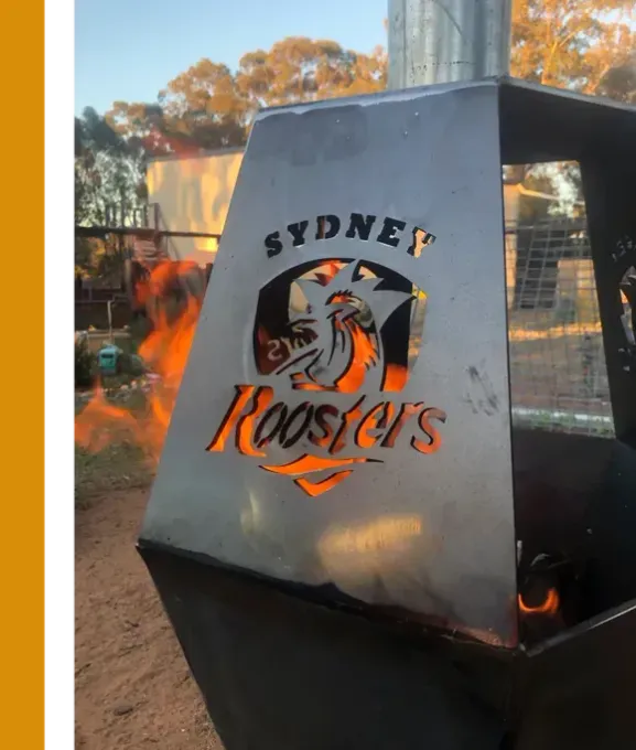 Steel Fabrication of Sydney Roosters Logo in Camp Fire welding