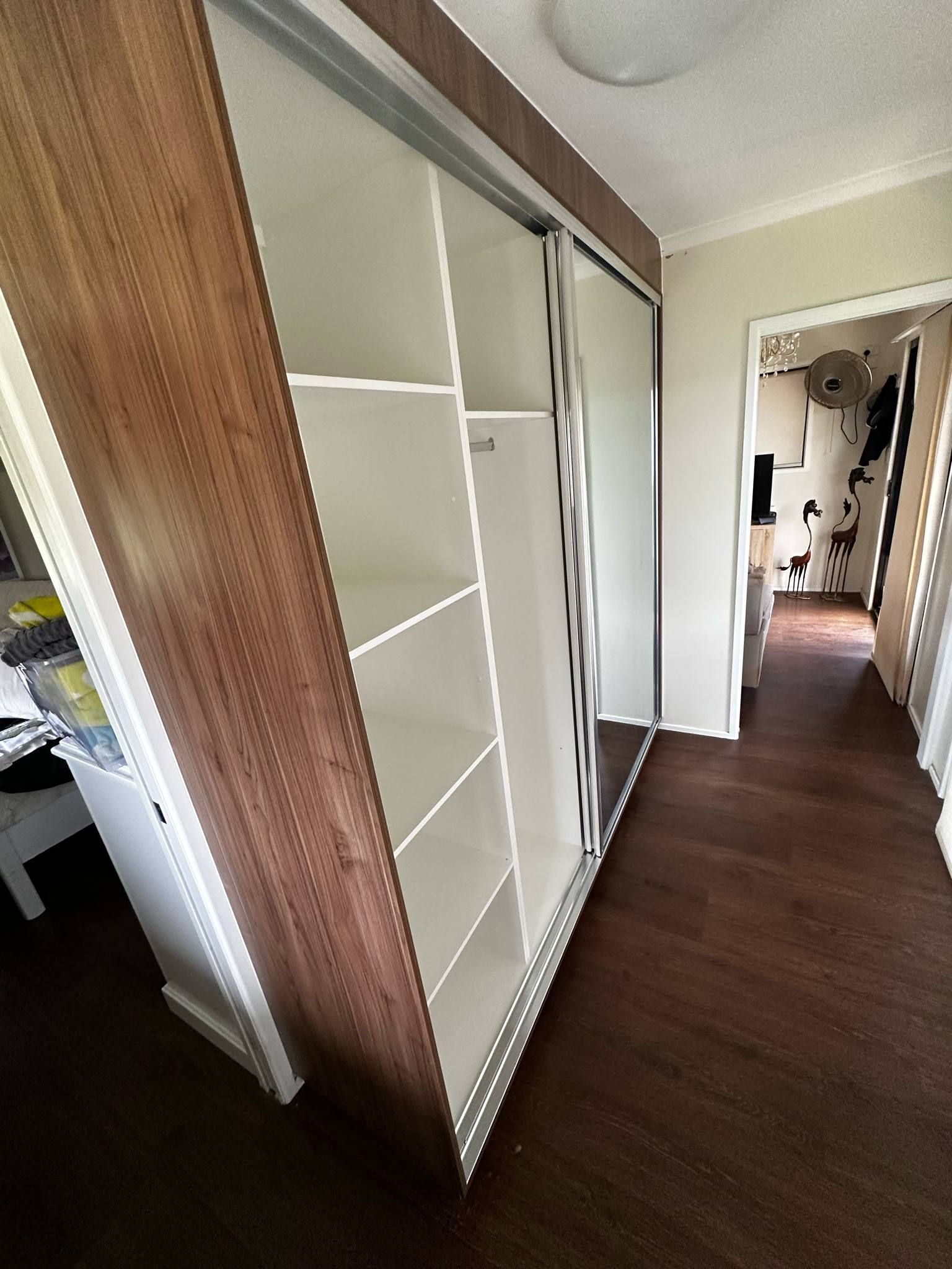 White Overhead Cabinet With Wine Rack Design — B & C Cabinets in Mareeba, QLD