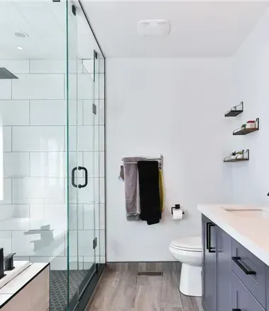Huntington Beach Bathroom Remodel with glass shower enclosure