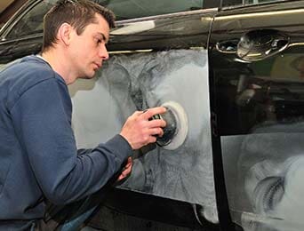 Mechanic Polishing Auto Body — Collision Repair in Portland, OR